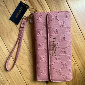 BRAND NEW W/TAGS PINK BEBE EMBOSSED WRISTLET RARE